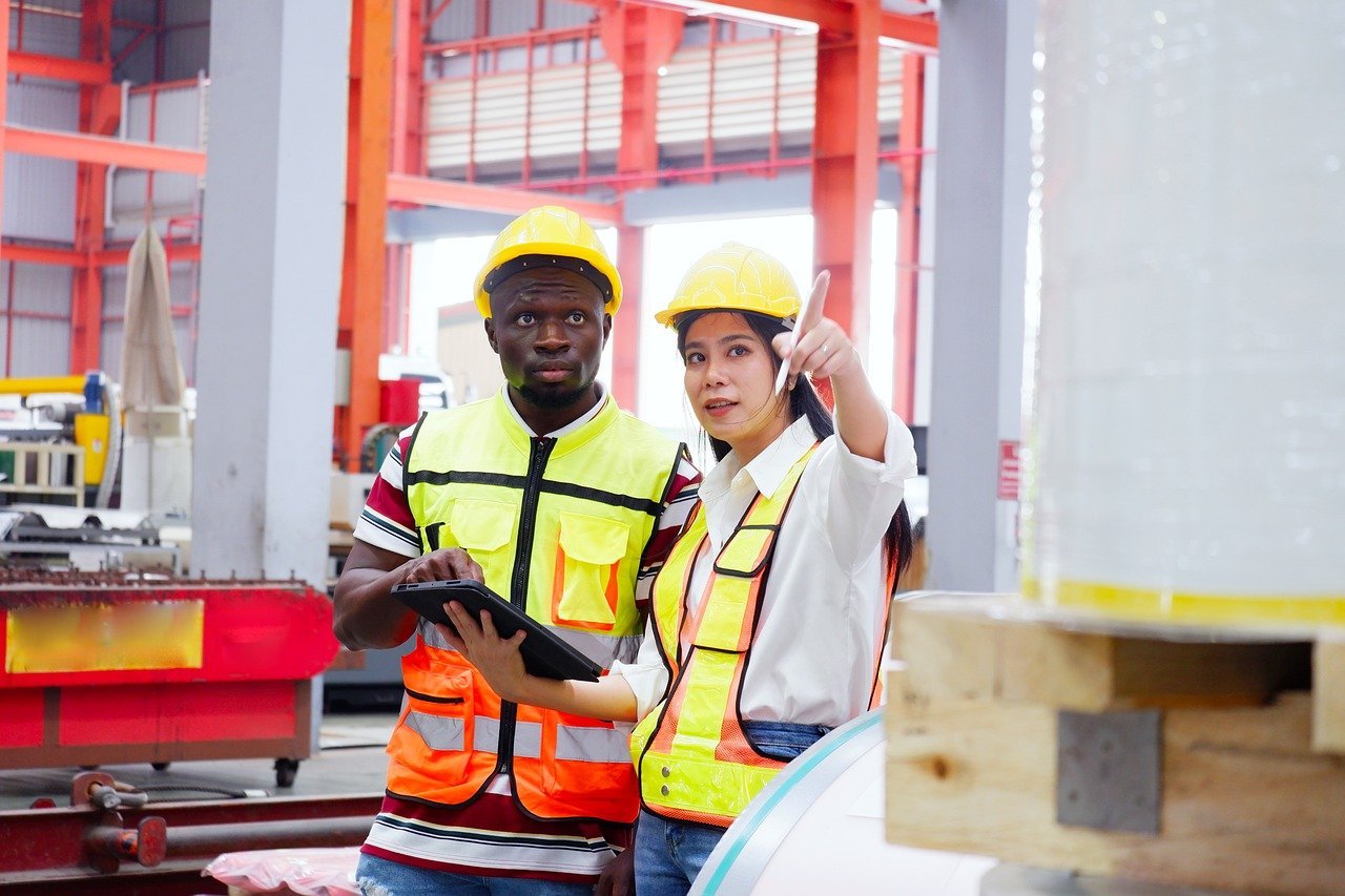 man and woman on construction site